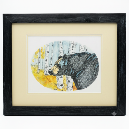 Bear in Aspens framed art print by Gene Irvin — pen, ink, and watercolor illustration of a black bear among white aspen trees with golden fall foliage, light yellow mat and dark wood frame, ready to hang
