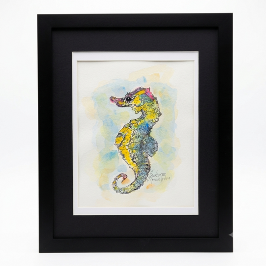 Seahorse original pen, ink, and watercolor illustration by Gene Irvin — intricate ink crosshatching over yellow, teal, and pink watercolor washes on an upright seahorse with curled tail, soft blue and yellow watercolor ocean background, white mat, flat black wood frame, 8x10 inch artwork, 12.375x15.5 inches overall, ready to hang