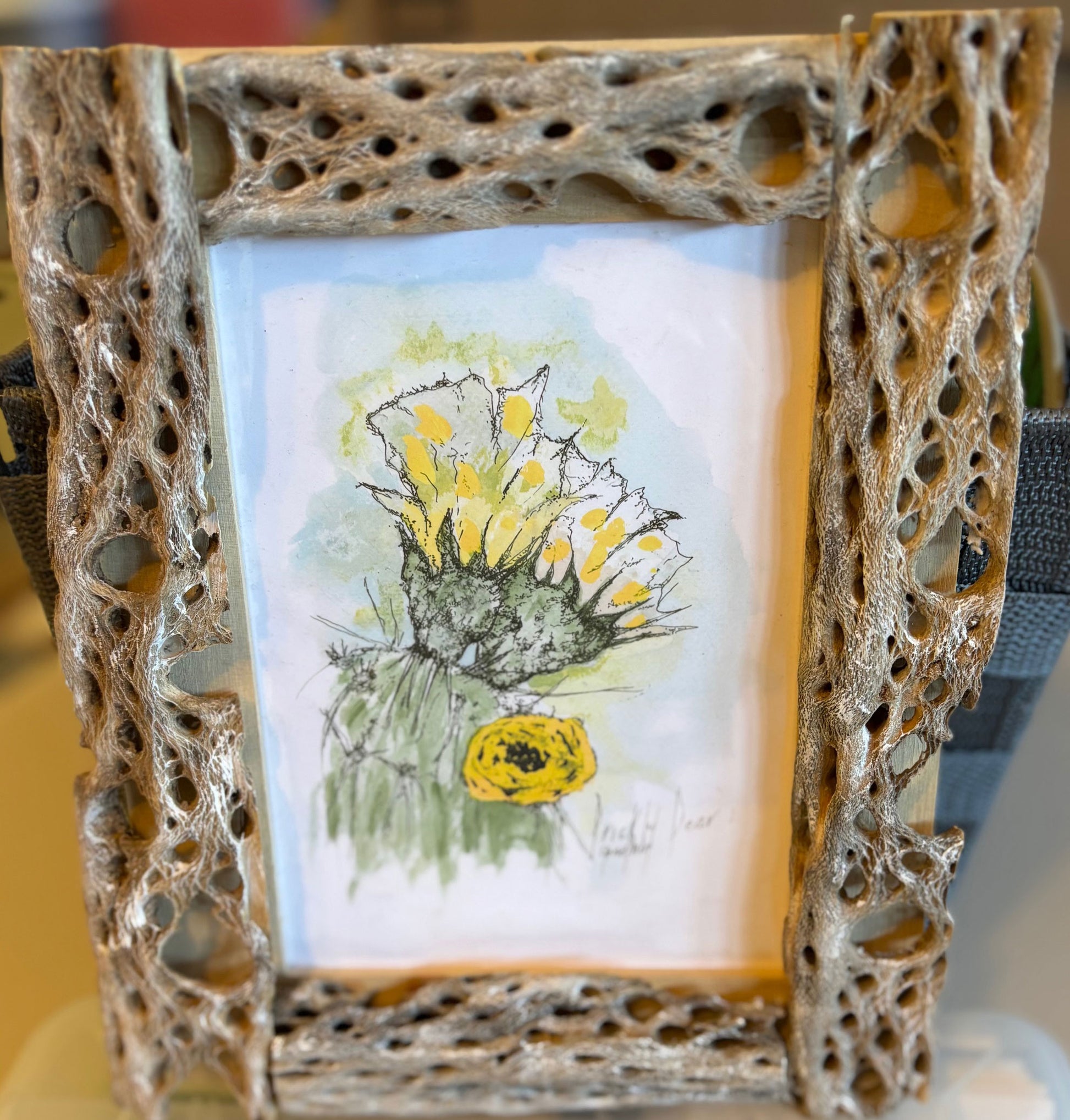 Yellow Prickly Pear Cactus Flower fine art print by Gene Irvin — loose ink and watercolor illustration of yellow prickly pear blooms, displayed in a handcrafted Cholla cactus skeleton frame by Bill Radtke, 5x7 print, 7.25x9.25 inches overall